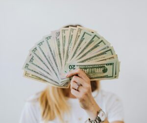 Top 10 Flips of 2025 person holding money