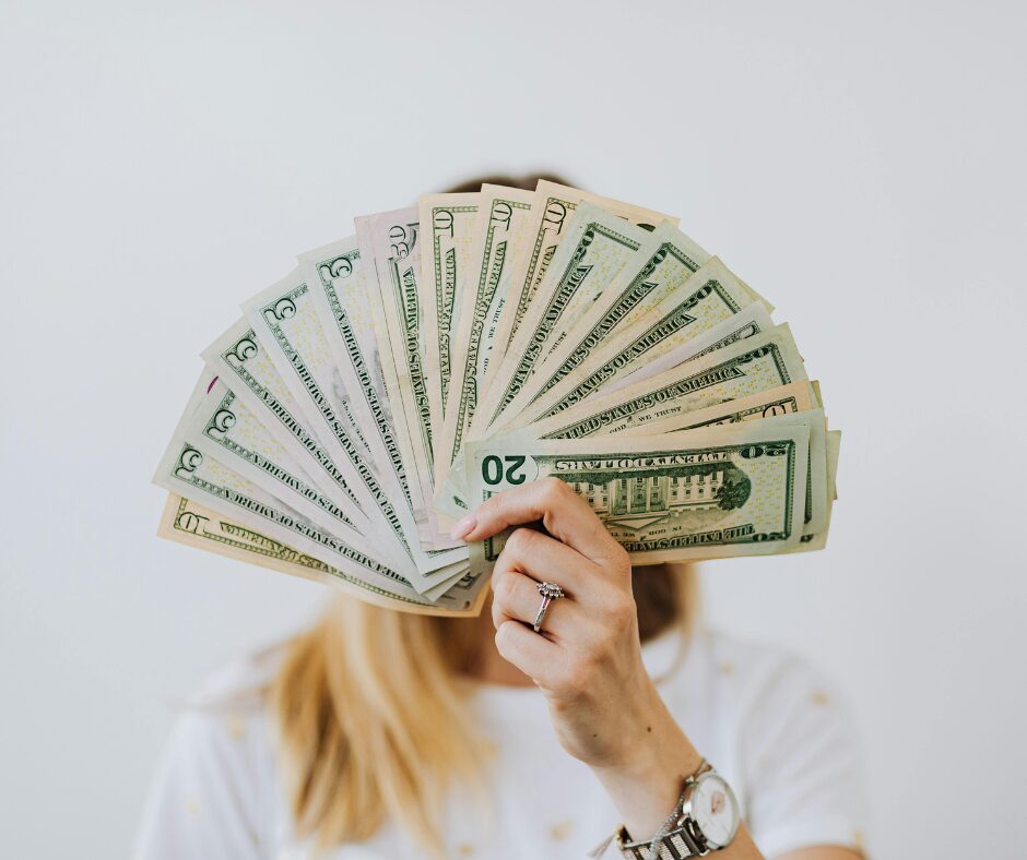 Top 10 Flips of 2025 person holding money